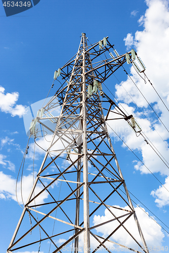 Image of High voltage tower with ragged high-voltage line