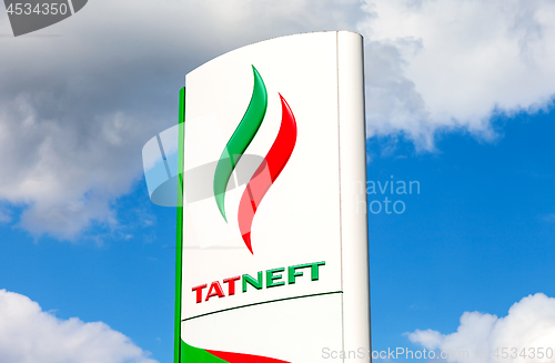 Image of  Logo of oil company Tatneft against blue sky. Tatneft is one of