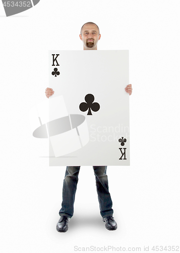 Image of Businessman with large playing card