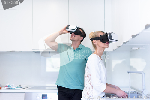 Image of young couple using VR-headset glasses of virtual reality