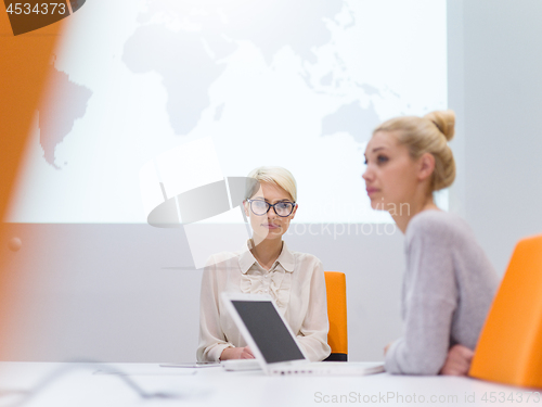 Image of Startup Business Team At A Meeting at modern night office buildi