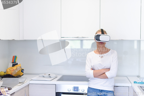 Image of woman using VR-headset glasses of virtual reality