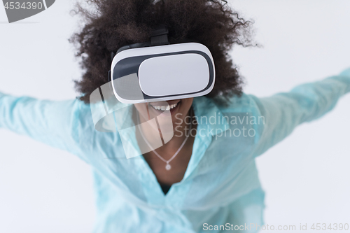 Image of black girl using VR headset glasses of virtual reality