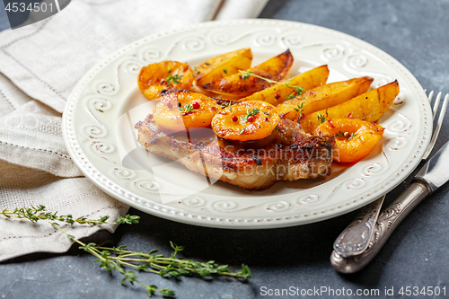 Image of Entrecote of pork with caramelized apricots.