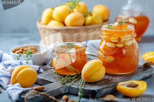 Image of Apricot jam with thyme and almonds.