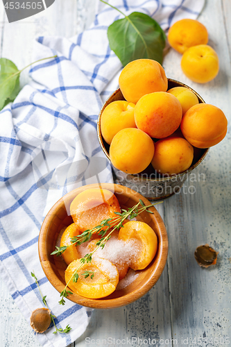 Image of Apricots for jam with thyme.
