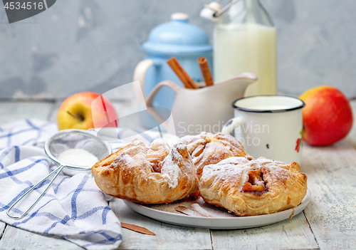 Image of Puffs with apple and cinnamon filling.