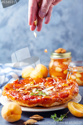 Image of Traditional upside-down pie with apricots.