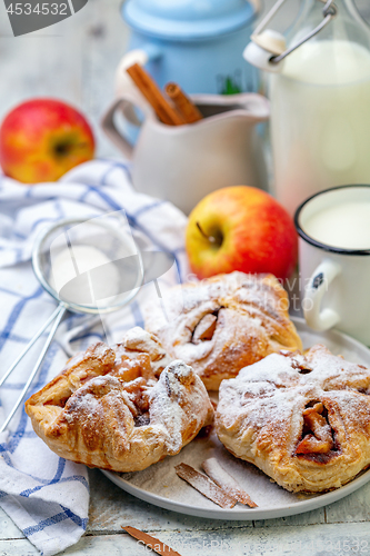 Image of Puff pastry rolls stuffed with apples.