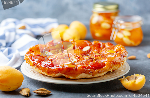 Image of Apricot and almond tarte tatin on a white plate.