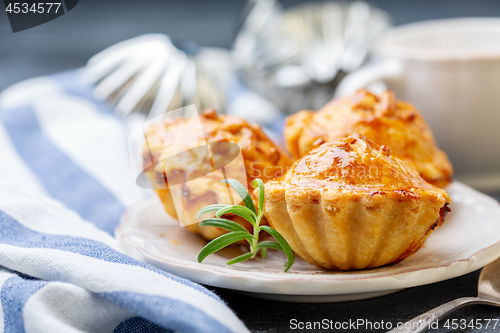 Image of Traditional meat mini pies on a plate.