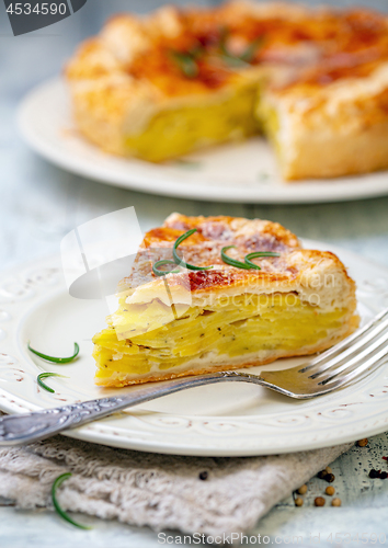 Image of Piece of French puff pastry with potatoes.