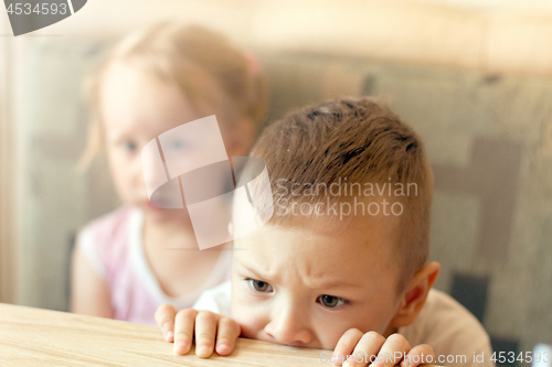 Image of Boy and Girl Watching TV