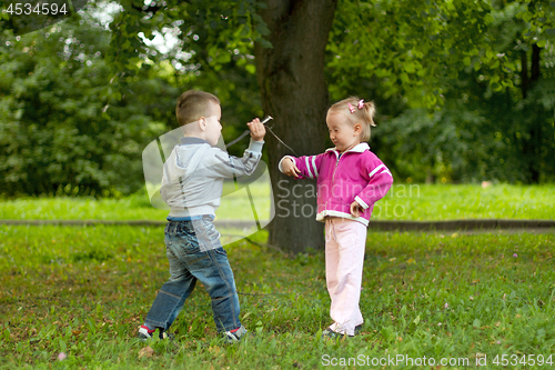 Image of Boy and girl in the forest