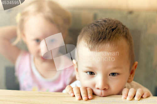 Image of Boy and Girl Watching TV