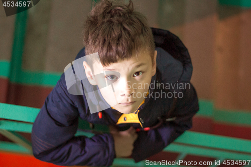 Image of Boy with cute eyes looking at camera