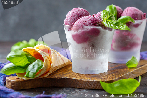 Image of Homemade blueberry ice cream with basil.