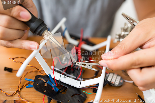 Image of Welding the parts of drone