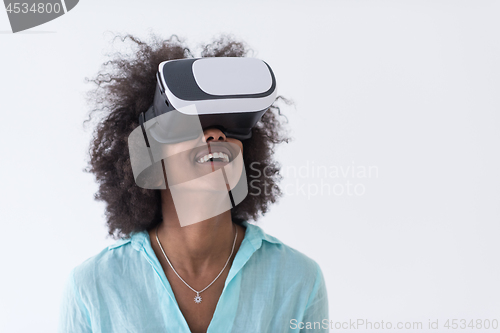 Image of black girl using VR headset glasses of virtual reality