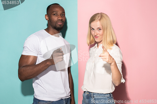 Image of Man and woman posing at studio during quarrel