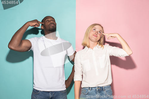 Image of Man and woman posing at studio during quarrel