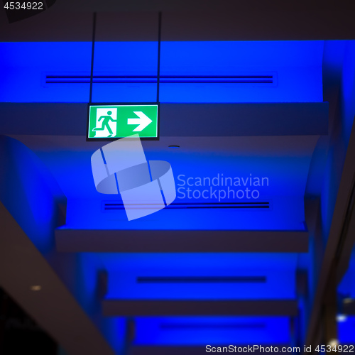 Image of typical escape sign in a modern building