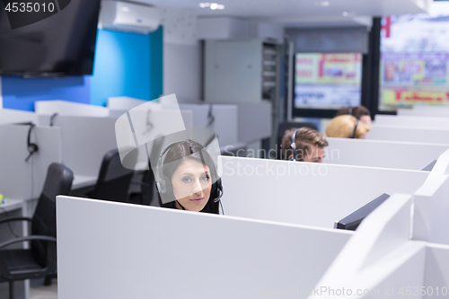 Image of female call centre operator doing her job