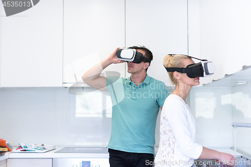 Image of young couple using VR-headset glasses of virtual reality