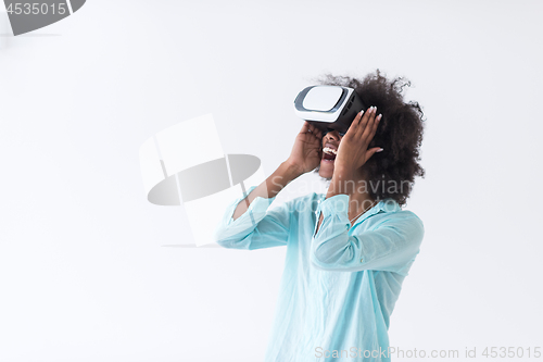 Image of black girl using VR headset glasses of virtual reality