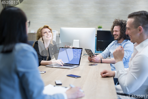 Image of Startup Business Team At A Meeting at modern office building