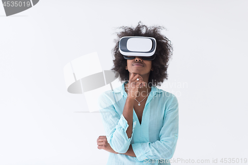 Image of black girl using VR headset glasses of virtual reality