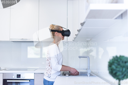 Image of woman using VR-headset glasses of virtual reality