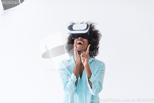 Image of black girl using VR headset glasses of virtual reality