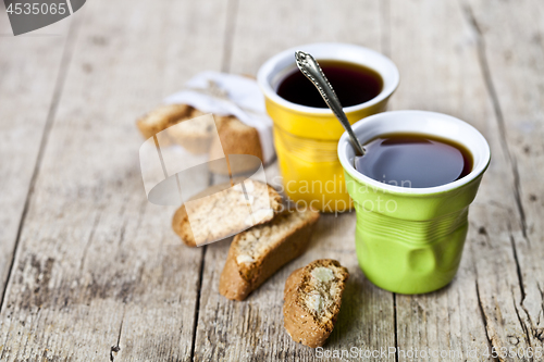 Image of Two cup of coffee and fresh Italian cookies cantuccini with almo