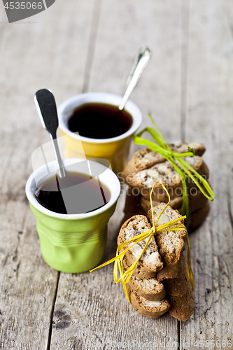 Image of Two cup of coffee and fresh Italian cookies cantuccini with almo