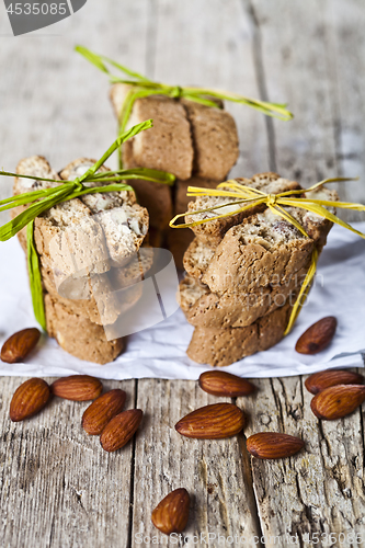 Image of Fresh Italian cookies cantuccini stacks and organic almond seeds