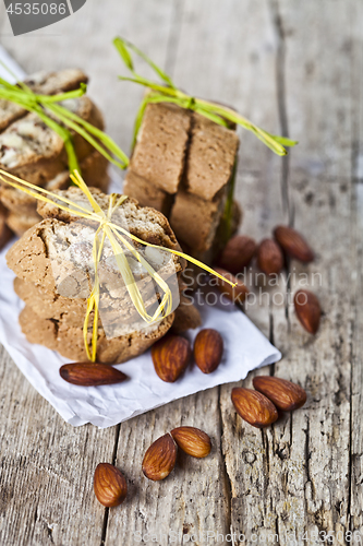 Image of Homemade fresh Italian cookies cantuccini stacks and organic alm