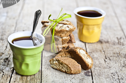 Image of Two cups of coffee and fresh Italian cookies cantuccini with alm