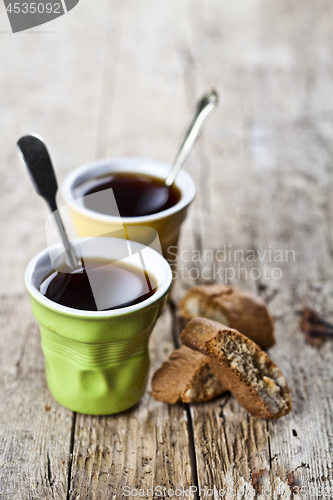 Image of Two cups of coffee and fresh Italian cookies cantuccini with alm