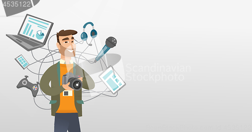 Image of Young caucasian man surrounded by her gadgets.