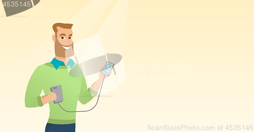 Image of Man reharging smartphone from portable battery.