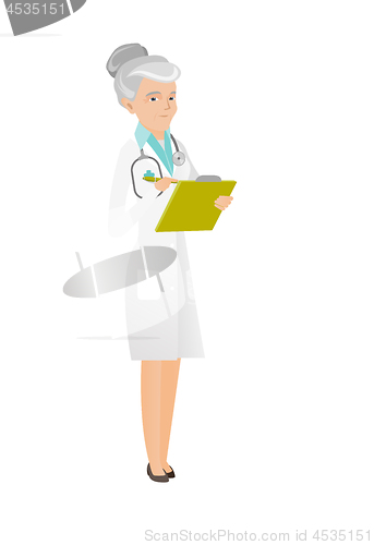 Image of Caucasian doctor holding clipboard with documents.