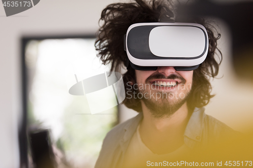 Image of man using VR-headset glasses of virtual reality