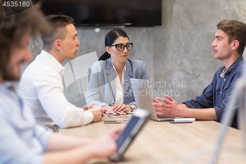 Image of Startup Business Team At A Meeting at modern office building