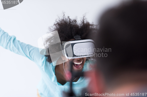 Image of black girl using VR headset glasses of virtual reality