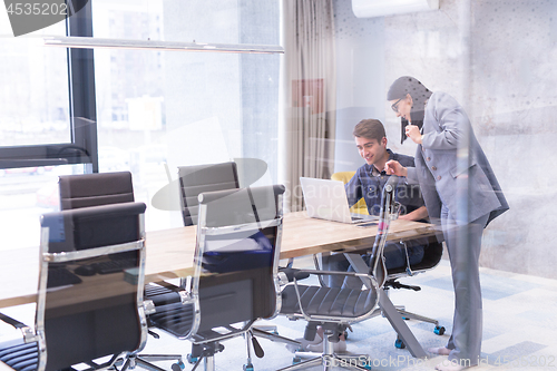 Image of Business People Working With laptop in office