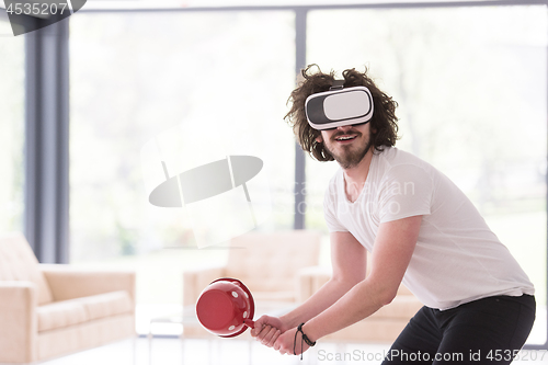 Image of man using VR-headset glasses of virtual reality