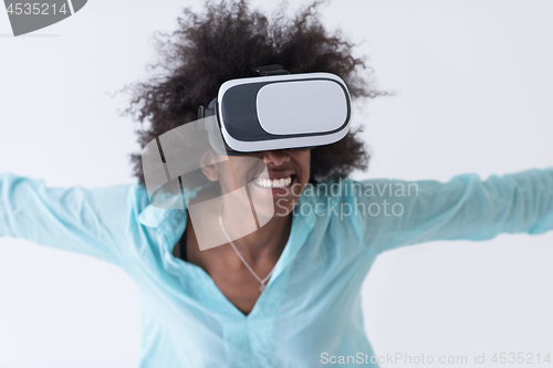 Image of black girl using VR headset glasses of virtual reality