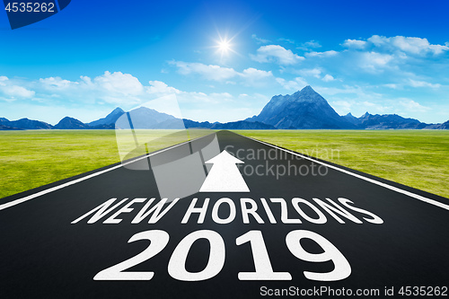 Image of road to horizon with text new horizons 2019