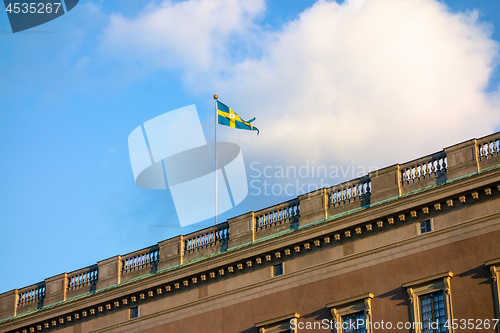 Image of swedish flag on the palace Stockholm